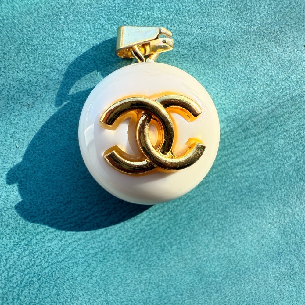 Authentic CHANEL A19 V Ivory & Gold Resin Pendant – Made in France 💛